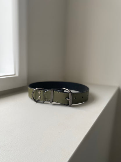 khaki green leather collar on a white background 