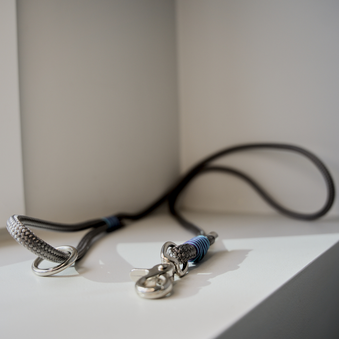 Grey dog leash with aqua and purple accents. Rope leash with nickel - plated safety hardware